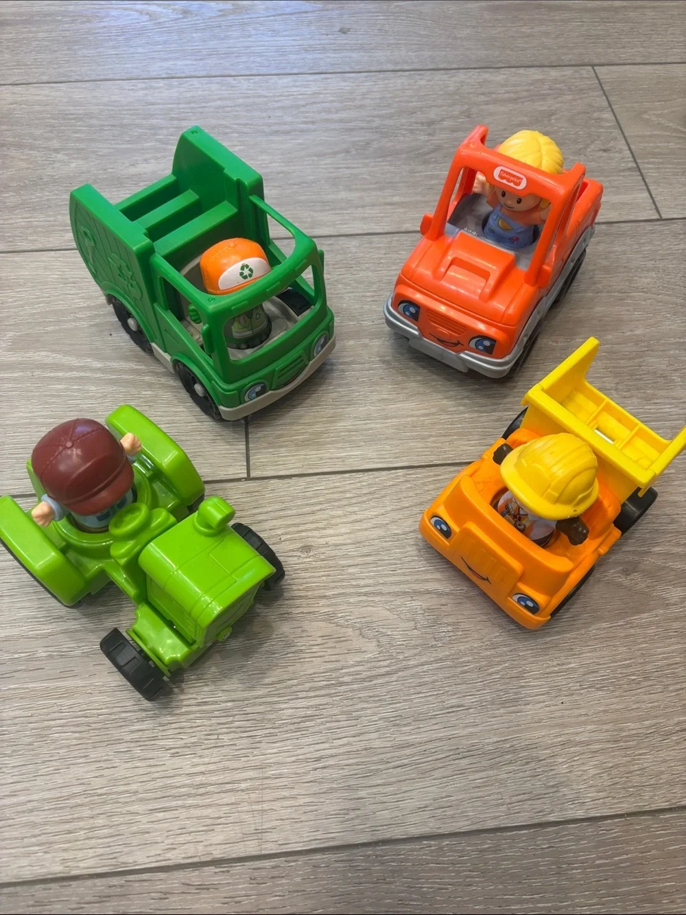 4 Fisher Price Little People vehicles and people